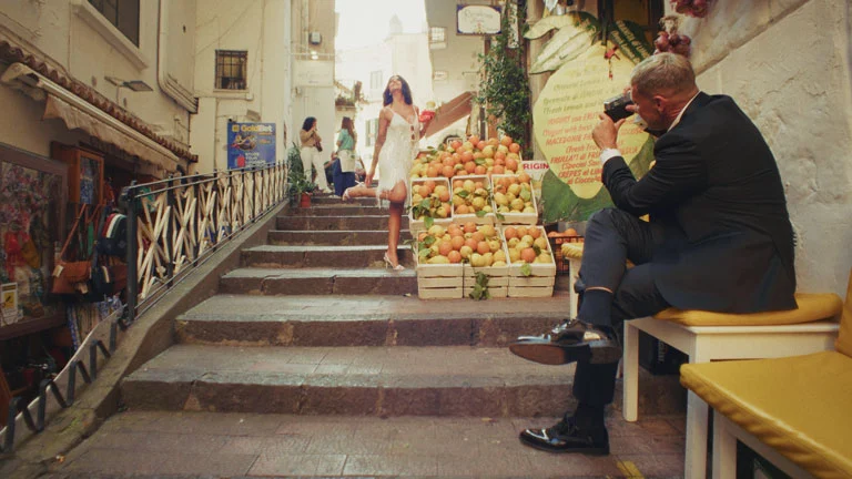 groom-takes-a-picture-to-the-bride-in-amalfi