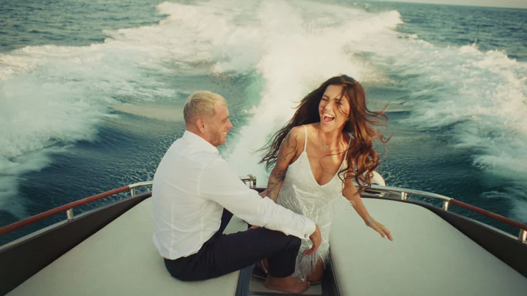 bride-and-groom-laughing-on-boat